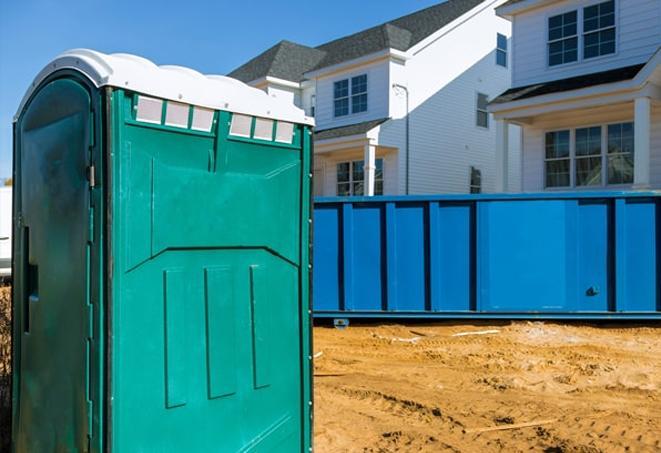 a line of port-a-potties offering a necessary break from work on a construction site